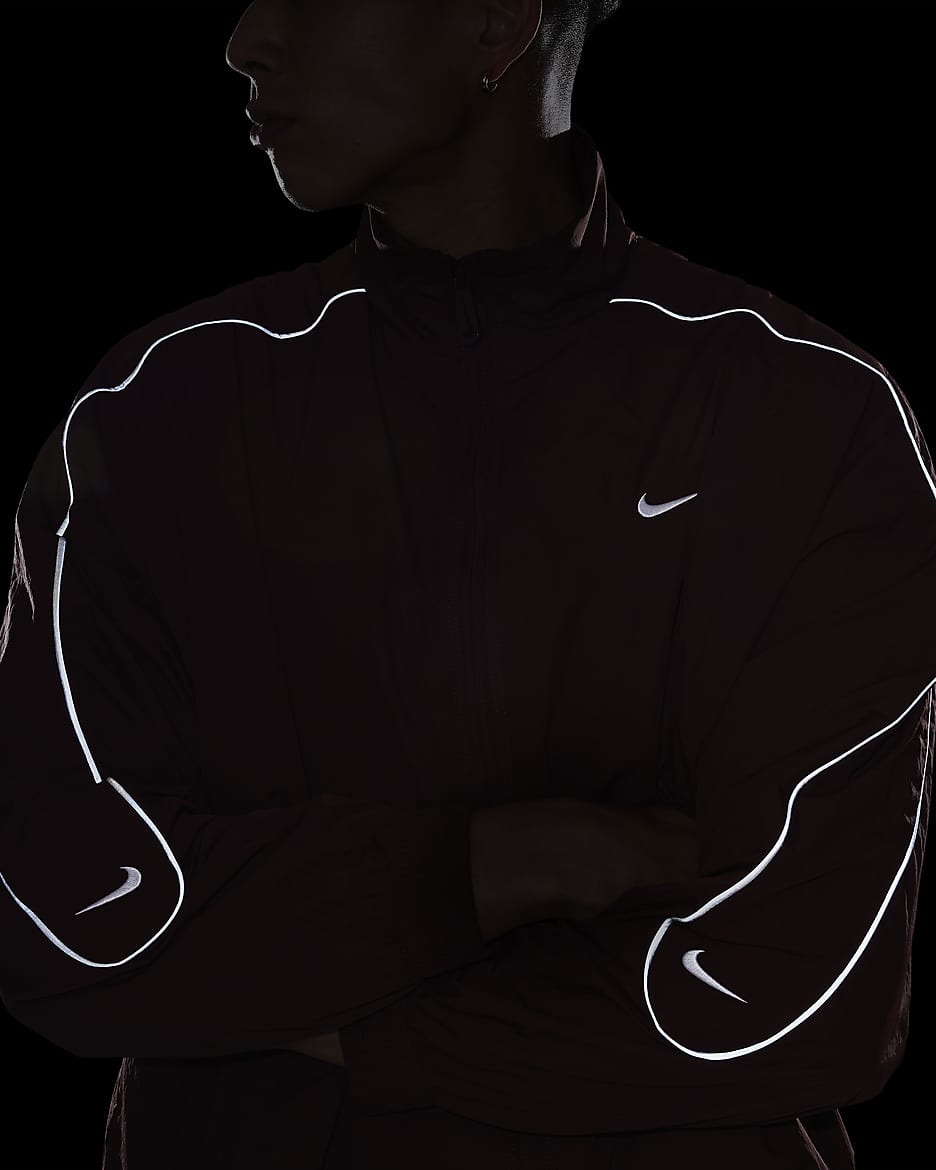 Nike reflective tracksuit hotsell